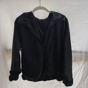 Size Small, Reebok. Classic black sports zip up!